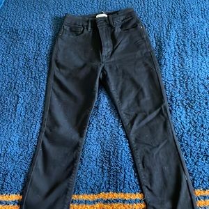 Good American skinny high rise black jeans.